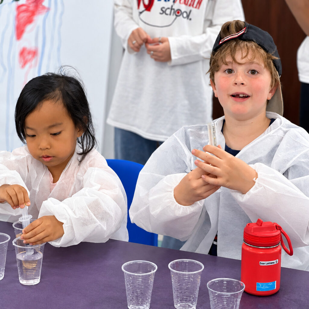 Children Conducting a Water Experiment