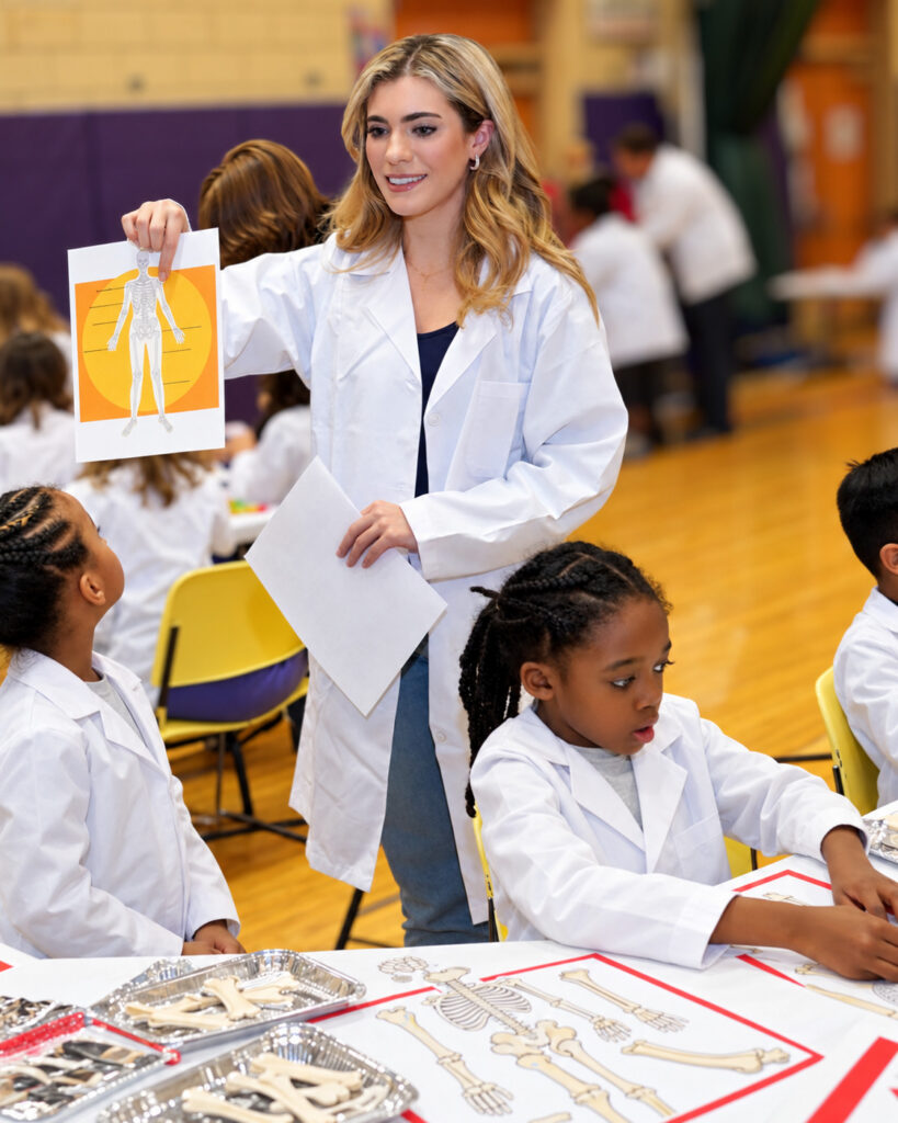Children Explore Anatomy in White Coats