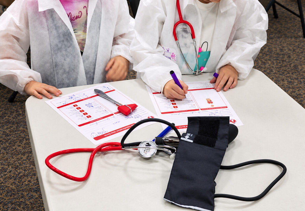 Children exploring medicine in the classroom