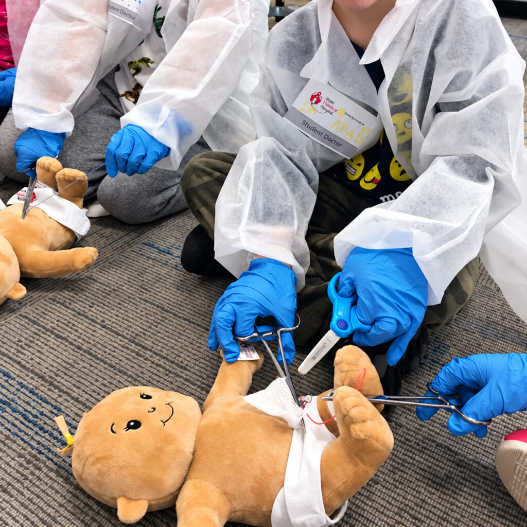 Hands-On Medical Lesson With Plush Dolls