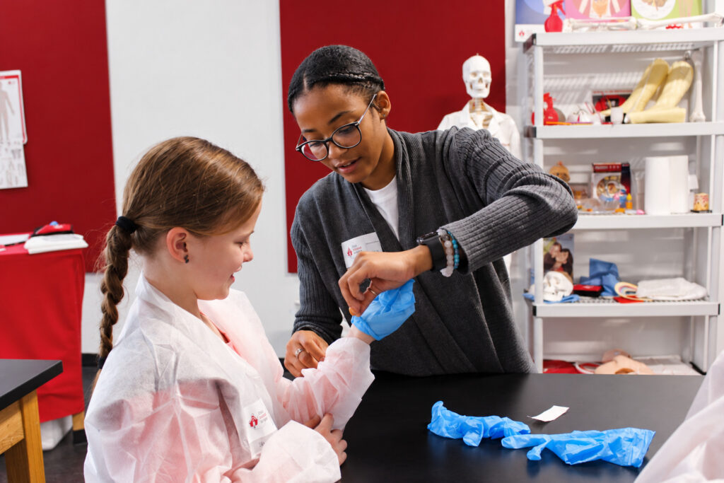 Teaching moment with a blue glove