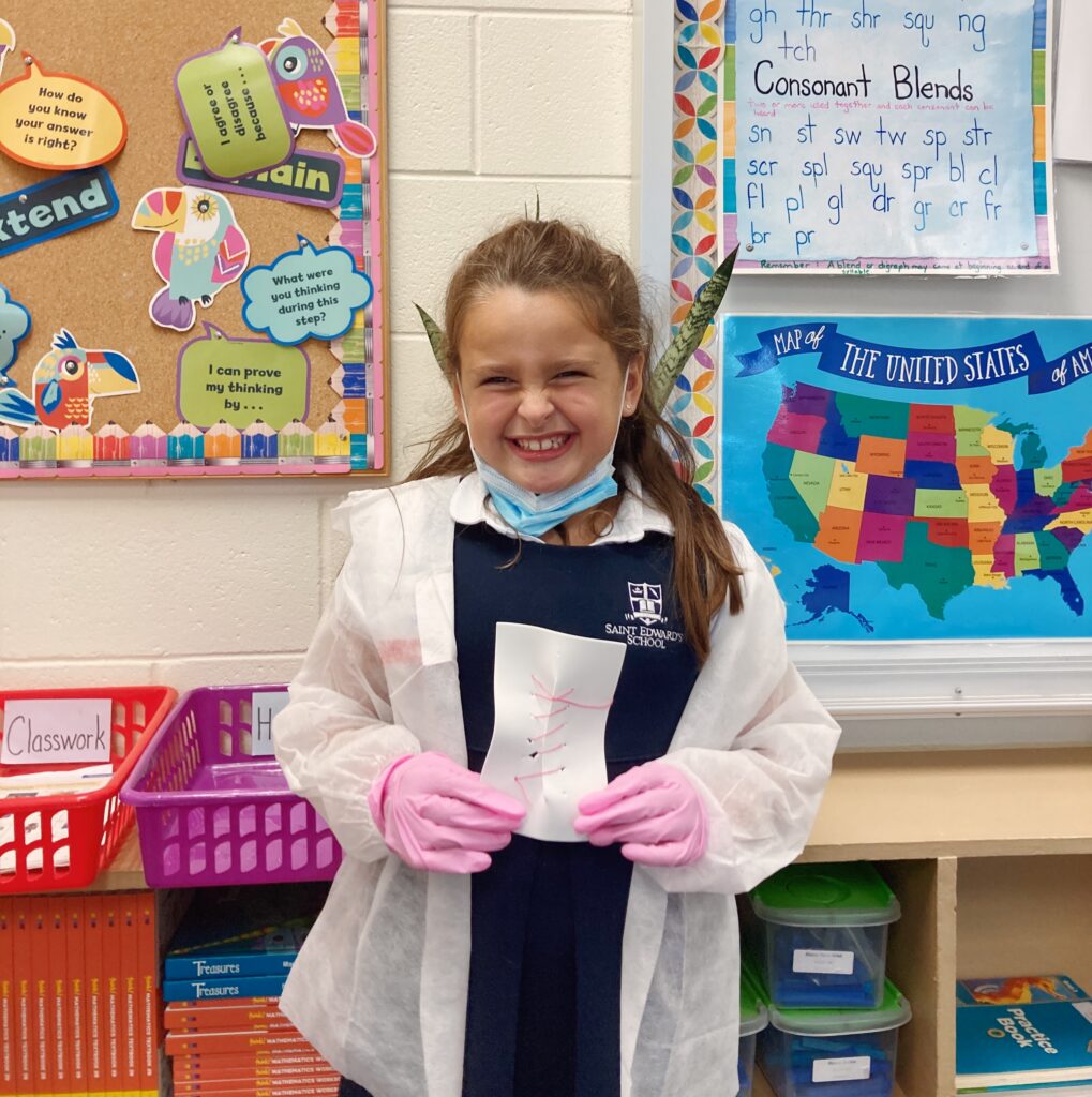 Elementary students participating in a Little Medical School hands-on healthcare STEM program aligned with Florida state science standards.