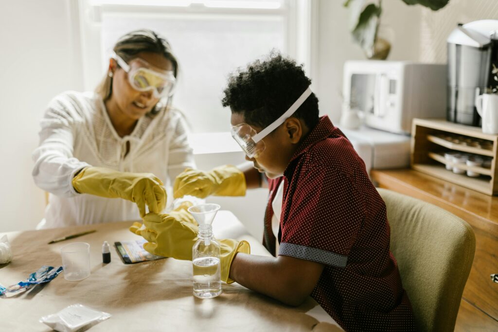 Children exploring hands-on at-home science activities inspired by Little Medical School® of the Treasure Coast, including experiments on bugs, the ocean, the heart, forensics, and baby development.”