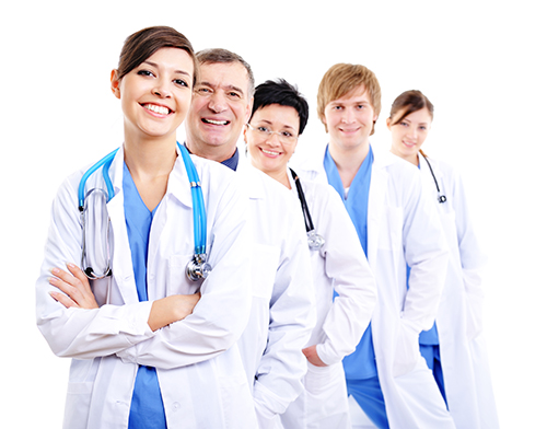 Row of doctors smiling and standing in a line